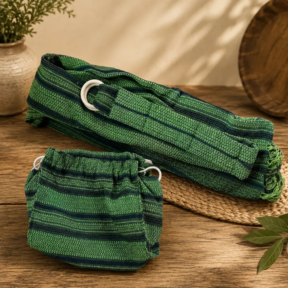 Green and black adjustable ring sling carrier from Oaxaca